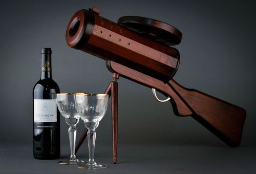 Wooden wine bottle stand in the form of a gun - MADEheart.com