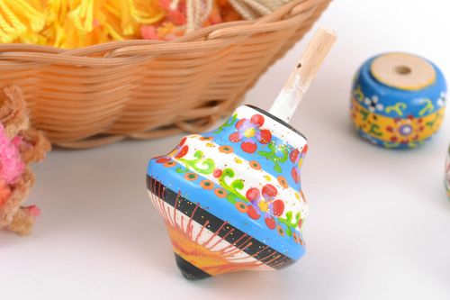 Small handmade educational wooden toy painted spinning top for children - MADEheart.com