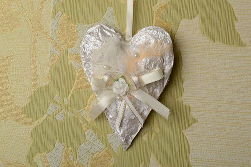 Handmade white heart-shaped carton wall hanging decorated with ribbons  - MADEheart.com
