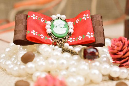 Handmade vintage rep ribbon brooch with cameo and beads in red and brown colors - MADEheart.com