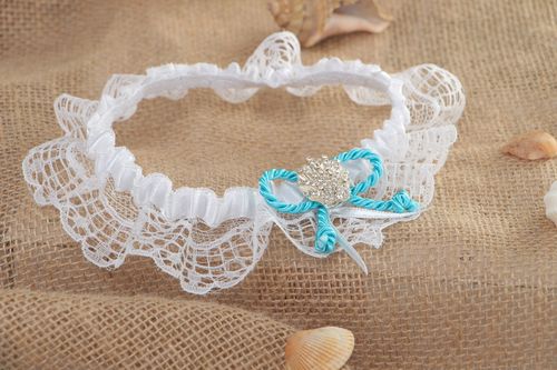 Tender handmade white stretch lace wedding bridal garter with blue cord and bead - MADEheart.com