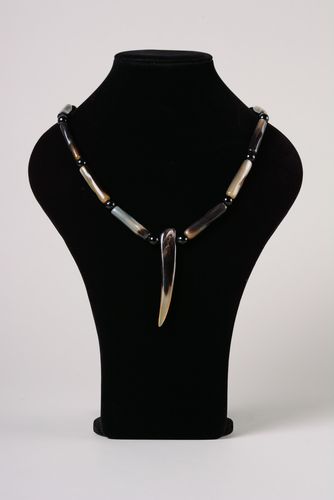Handmade womens cow horn necklace in gray color palette in ethnic style - MADEheart.com