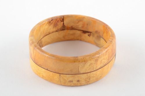 Fashionable handmade wrist bracelet carved of light wood and varnished for women - MADEheart.com