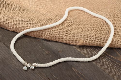 Beautiful elegant thin beaded cord necklace of white color - MADEheart.com