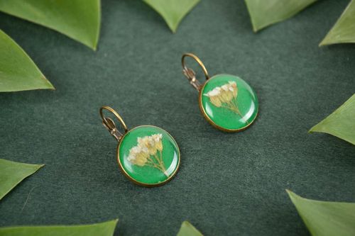 Homemade round green epoxy resin earrings with beautiful flowers inside - MADEheart.com