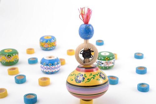 Small funny handmade painted wooden smart toy spinning top for children - MADEheart.com